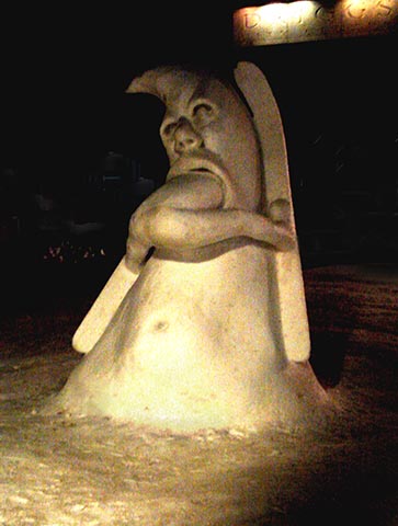 Greg Geffner - Skier Eater Snow Sculpture At Night