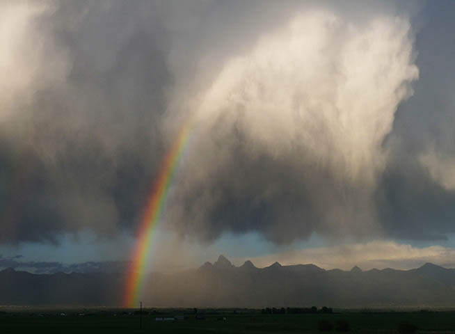 Greg Geffner Photo. Rainbow Over The Tetons With Cloud.